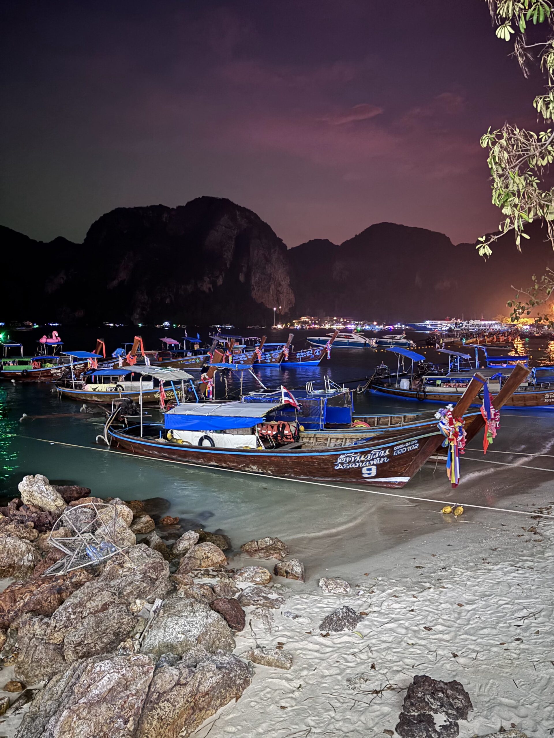 Boats at night on Phi Phi Island – travel guide photo
