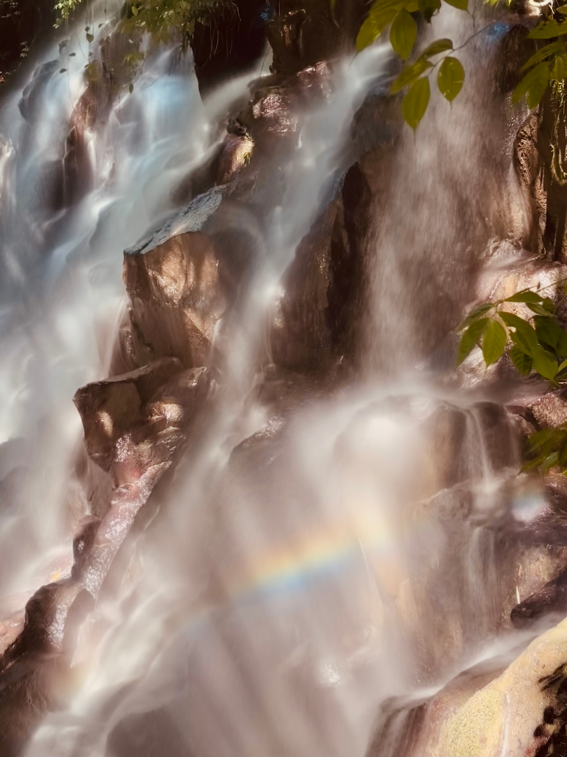 Sunlight hitting the rocks at Kanto Lampo Waterfall near Ubud, Bali